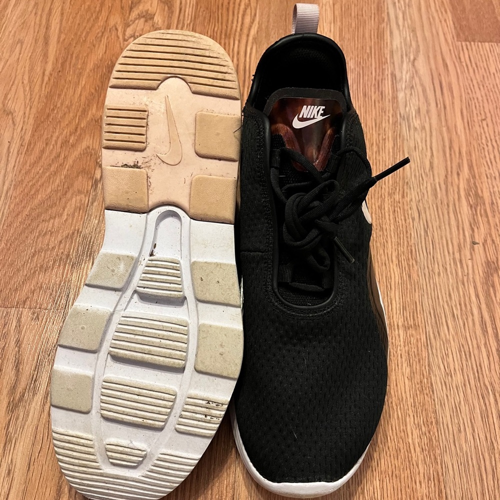 Black and tortoise Nike sneakers, worn twice
